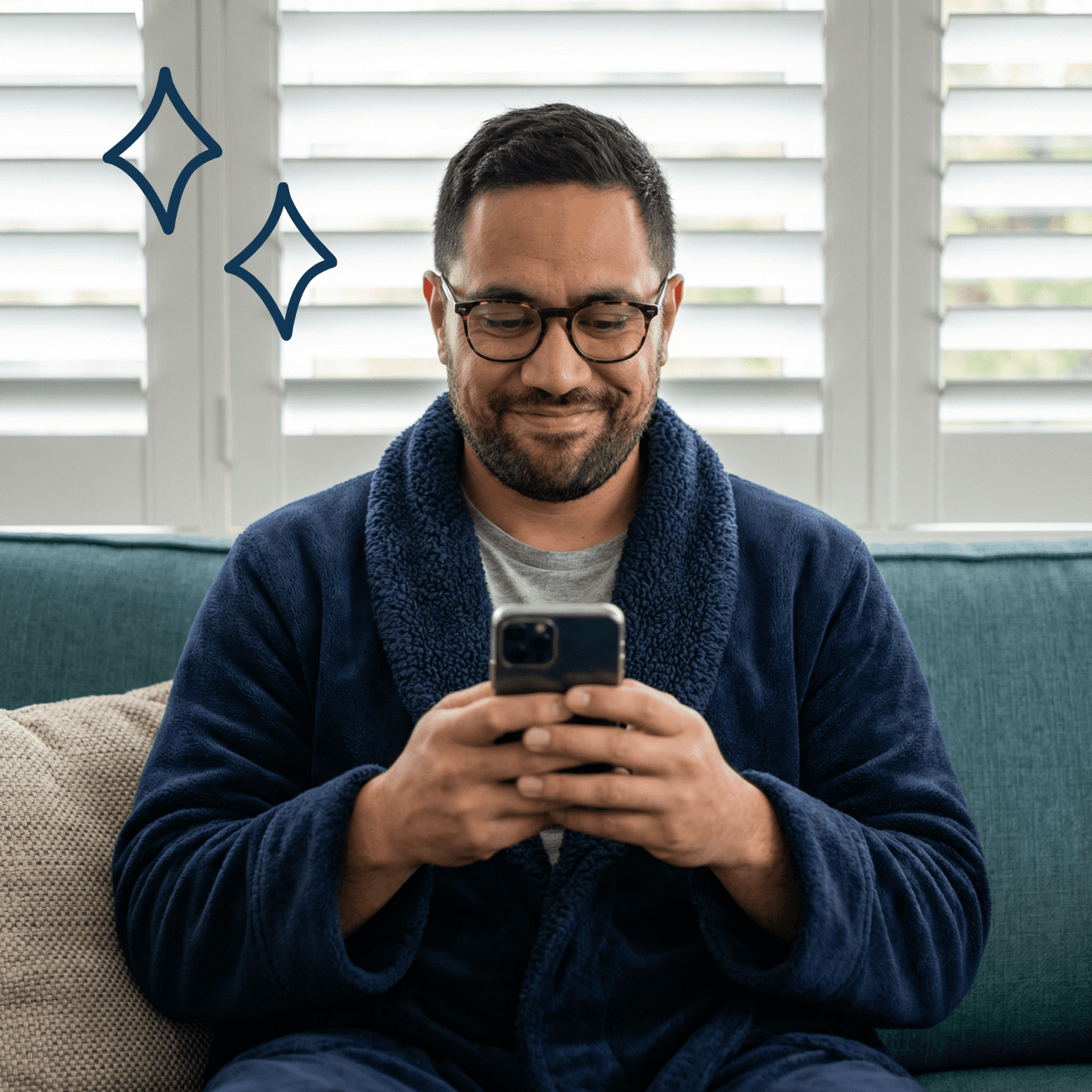 Homeowner smirking at phone while answering solar quiz on couch
